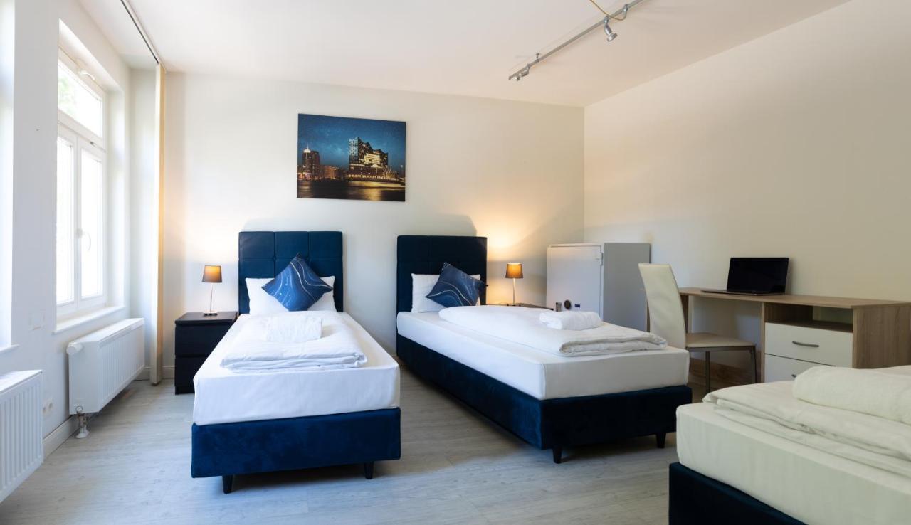 Dreibettzimmer mit Gemeinschaftsbad