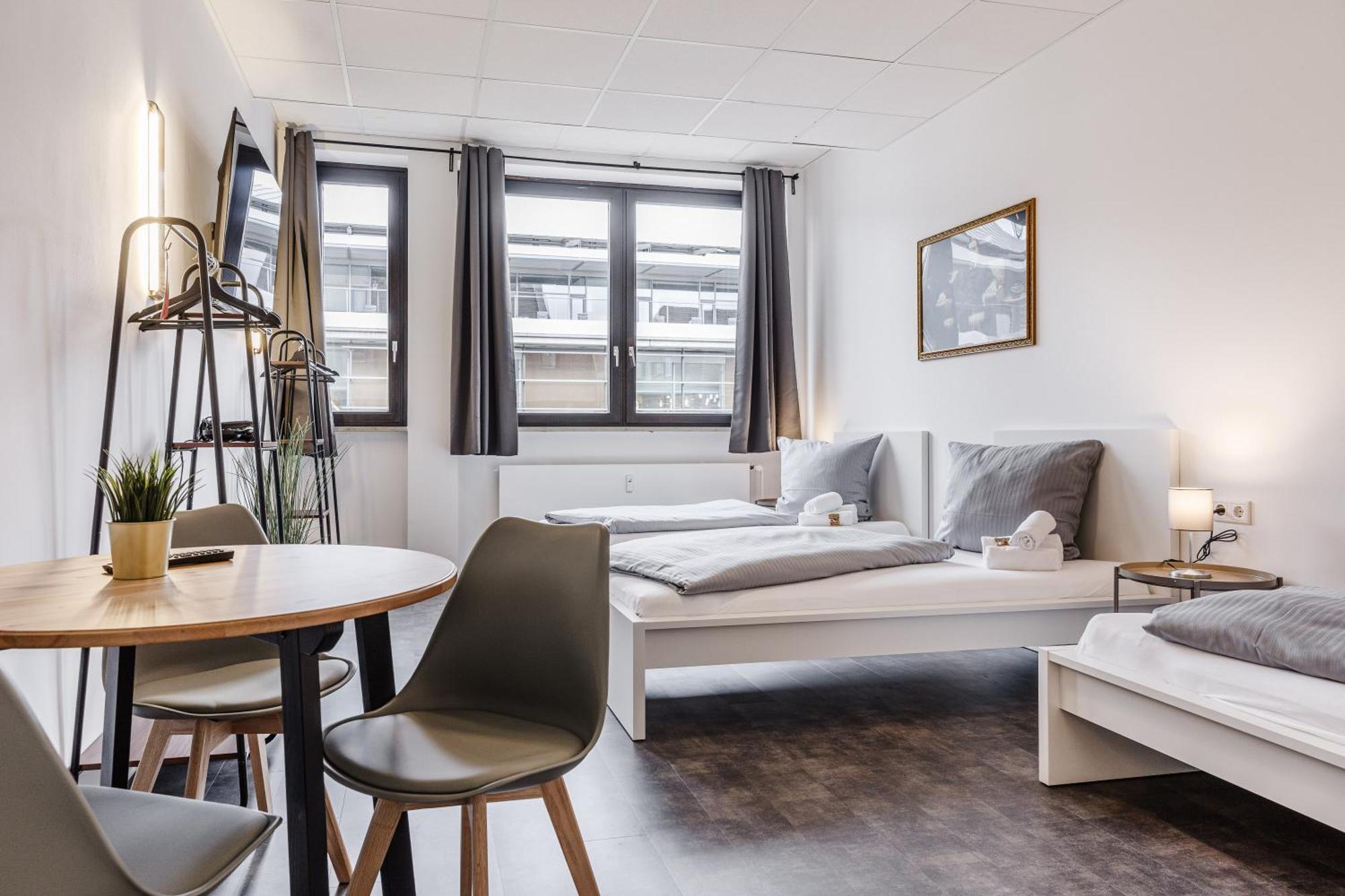 Dreibettzimmer mit Gemeinschaftsbad