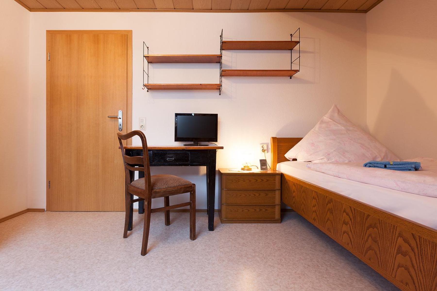 Einzelzimmer mit Gemeinschaftsbad