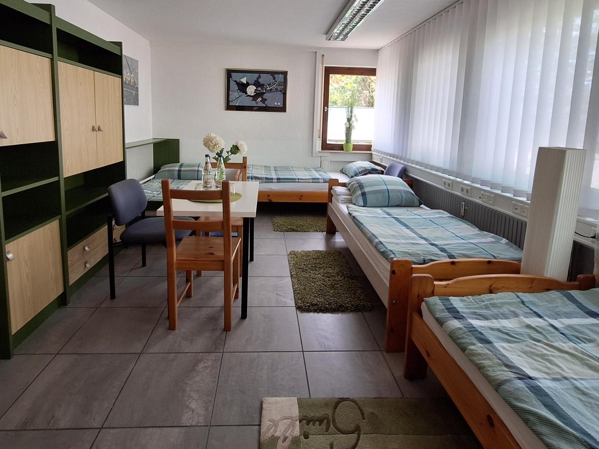 Vierbettzimmer mit Gemeinschaftsbad