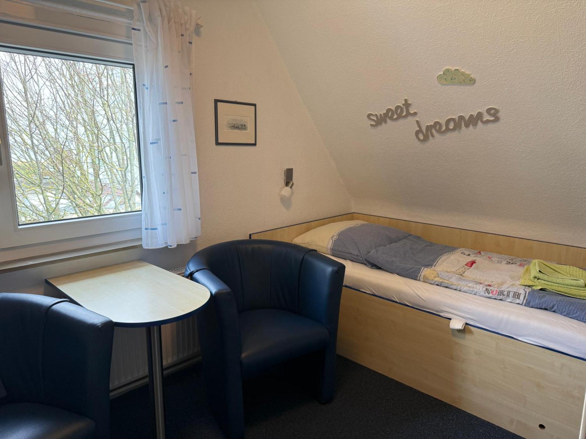 Kleines Zweibettzimmer