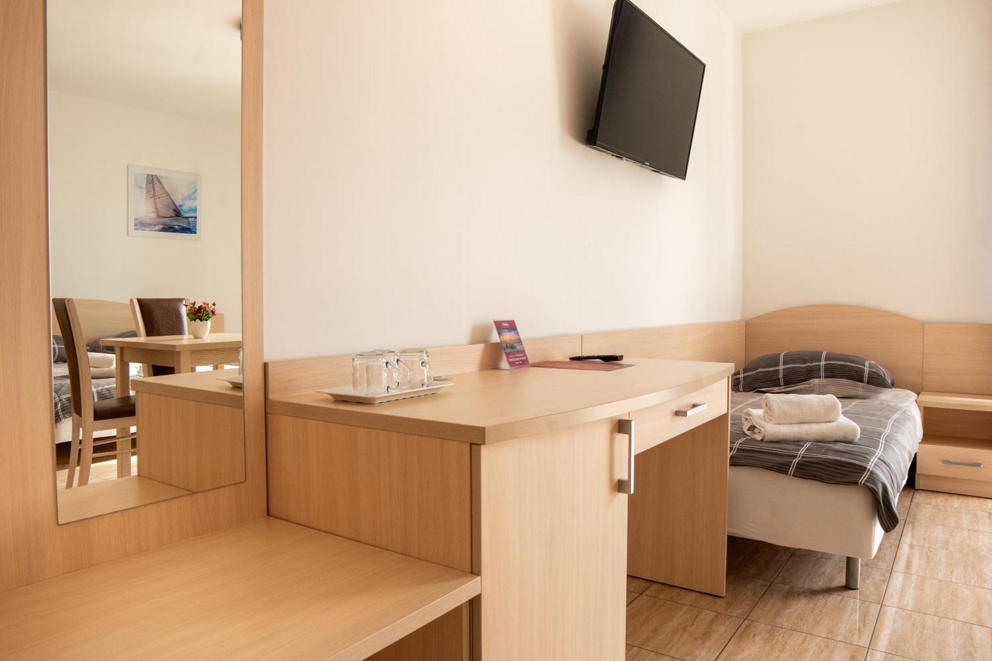 Dreibettzimmer mit Balkon
